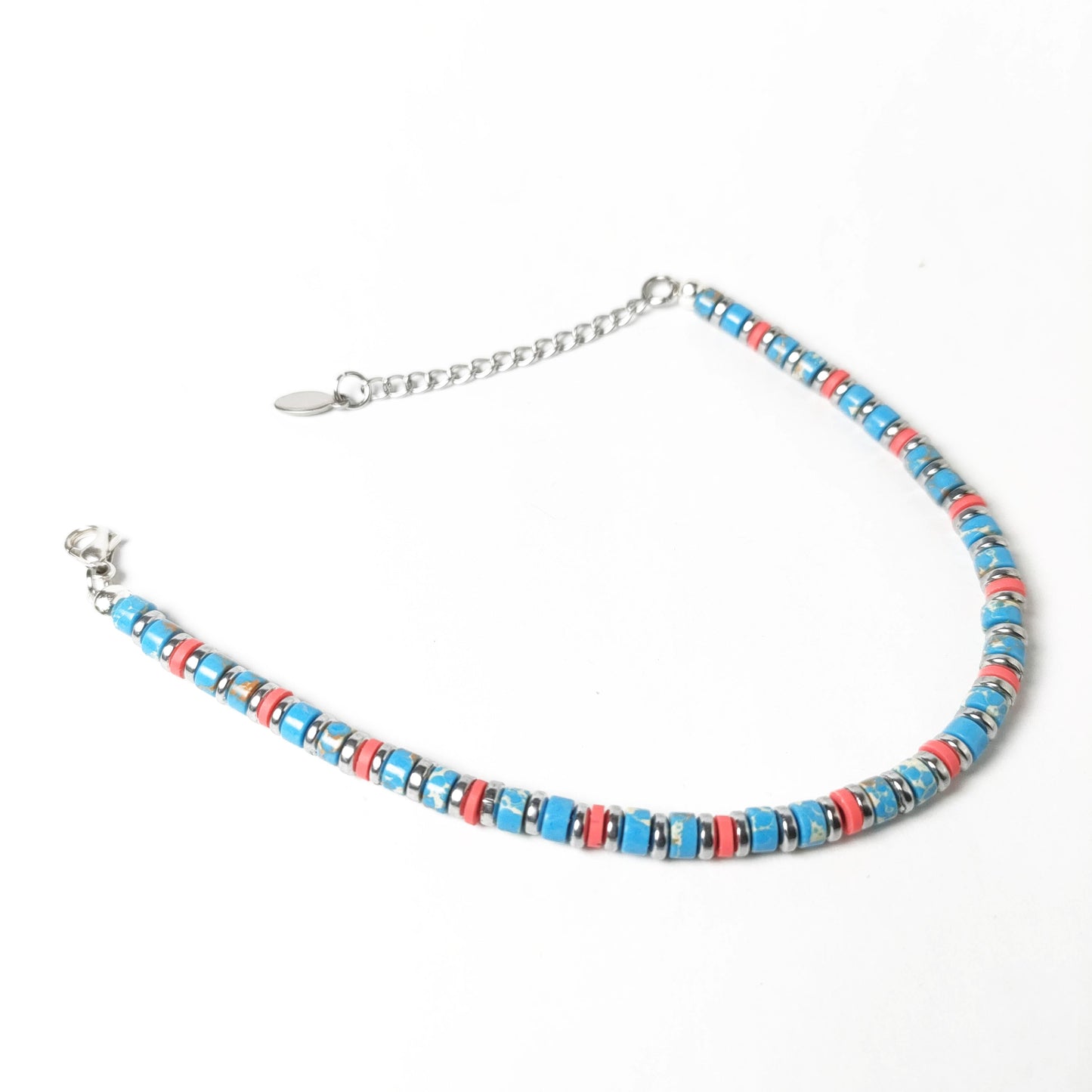 Bracciale con Rondelle di Turchese ed Ematite Argento Inserti Fuxia